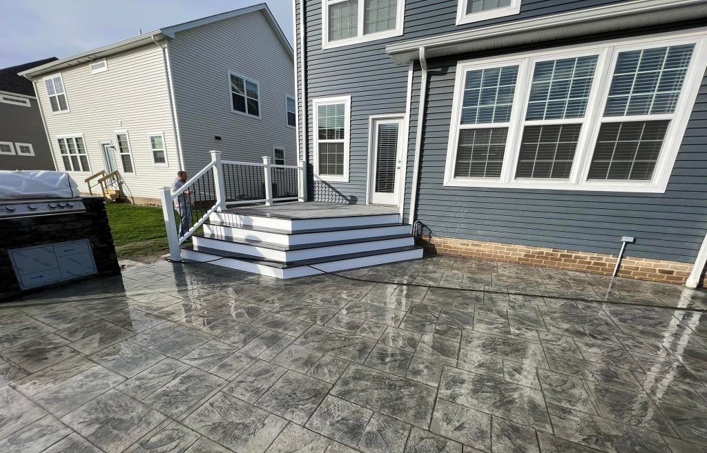 Cherokee River shows a home with stylish patio. Deck and maintenance services make it easy to upgrade your home.